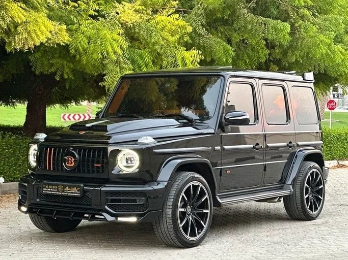 Подержанный Mercedes-Benz G-Class AMG 63 AMG II (W463), 4.0 л, 2021 в Шардже от Taj Al Sultan Used Cars Черный цвет. Японская | AUTO.AE