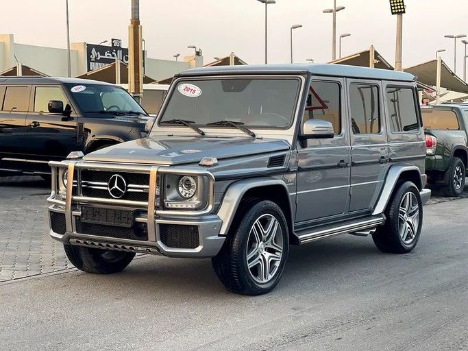 Подержанный Mercedes-Benz G-Class AMG 63 AMG I (W463) Рестайлинг 3, 5.5 л, 2015 в Шардже от Taj Al Impratoor Used Cars Серый цвет. GCC | AUTO.AE