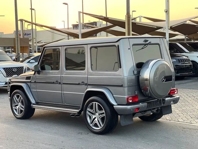 Подержанный Mercedes-Benz G-Class AMG 63 AMG I (W463) Рестайлинг 3, 5.5 л, 2015 в Шардже от Taj Al Impratoor Used Cars Серый цвет. GCC | AUTO.AE