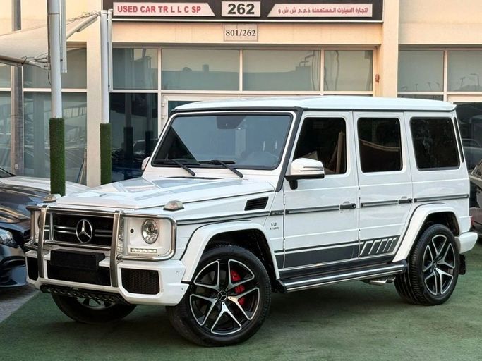 Подержанный Mercedes-Benz G-Class AMG 63 AMG I (W463) Рестайлинг 2, 5.5 л, 2014 в Шардже от Noor Al Seyoh Used Cars Белый цвет. GCC | AUTO.AE
