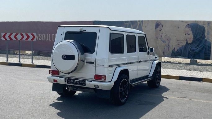 Подержанный Mercedes-Benz G-Class AMG 63 AMG I (W463) Рестайлинг 3, 5.5 л, 2015 в Шардже от Halla Cars Белый цвет. GCC | AUTO.AE