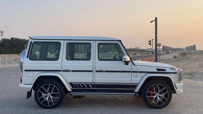 Used Mercedes-Benz G-Class AMG 63 AMG I (W463) Facelift 2, 5.5 l, 2014 in Sharjah by Halla Cars, White color. GCC Specs | AUTO.AE