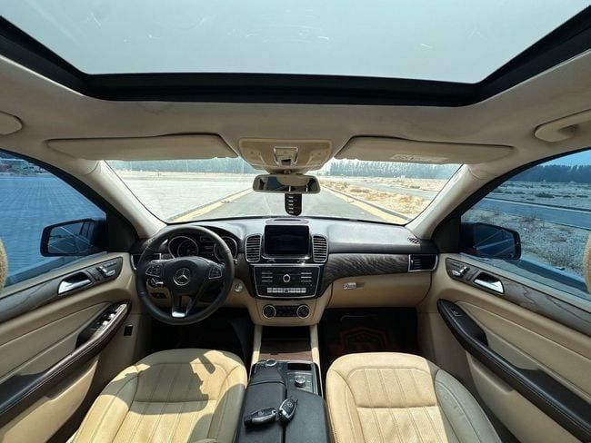 Подержанный Mercedes-Benz GLE 400 I (W166), 3.0 л, 2016 в Шардже от Berlin Used Cars Серый цвет. GCC | AUTO.AE