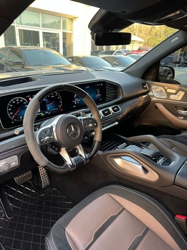 Подержанный Mercedes-Benz GLS AMG 63 AMG II (X167), 4.0 л, 2021 в Шардже от Noor Al Seyoh Used Cars Черный цвет. GCC | AUTO.AE