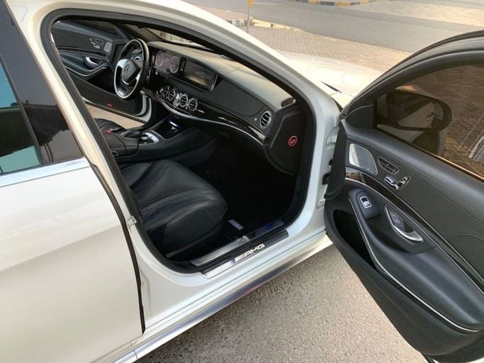 Used Mercedes-Benz S-Class AMG 63 AMG III (W222, C217), 5.5 l, 2014 in Sharjah by Titanium Used Cars, White color. Japanese Specs | AUTO.AE