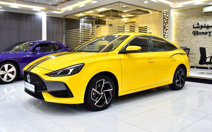 Подержанный MG 5 (GT) II, 1.5 л, 2023 в Шардже от Honey Jidosha Used Cars Tr. Желтый цвет. GCC | AUTO.AE | Объявление #273436