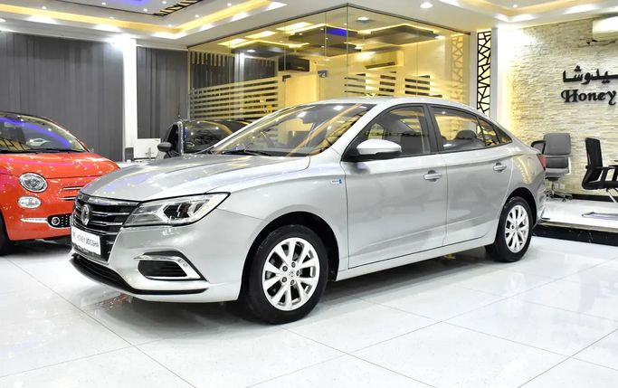 Подержанный MG 5 (GT) I Рестайлинг, 1.5 л, 2024 в Шардже от Honey Jidosha Used Cars Tr. Серебристый цвет. GCC | AUTO.AE | Объявление #273448