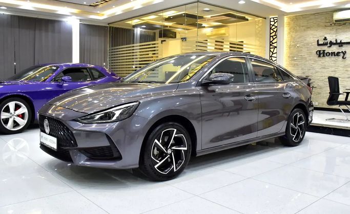 Подержанный MG 5 (GT) II, 1.5 л, 2023 в Шардже от Honey Jidosha Used Cars Tr. Серый цвет. GCC | AUTO.AE | Объявление #273452