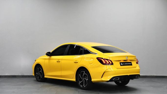Used MG 5 II, 1.5 l, 2023 in Sharjah by Al Qassem Cars Trading, Yellow color. GCC Specs | AUTO.AE