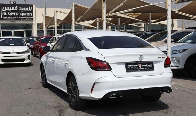 Used MG 5 II, 1.5 l, 2022 in Sharjah by Al Sayed Khamis Used Cars, White color. GCC Specs | AUTO.AE