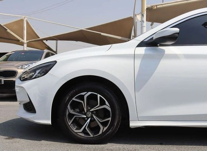 Used MG 5 II, 1.5 l, 2022 in Sharjah by Al Sayed Khamis Used Cars, White color. GCC Specs | AUTO.AE