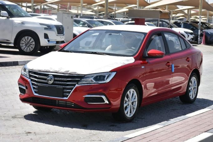 Новый MG 5 I Рестайлинг, 1.5 л, 2024 в Шардже от Alfaris Used Cars Красный цвет. Other | AUTO.AE