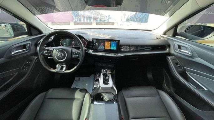 Подержанный MG 5 II, 1.5 л, 2022 в Шардже от Halla Cars Черный цвет. GCC | AUTO.AE