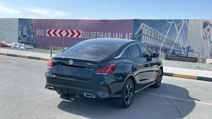 Подержанный MG 5 II, 1.5 л, 2022 в Шардже от Halla Cars Черный цвет. GCC | AUTO.AE