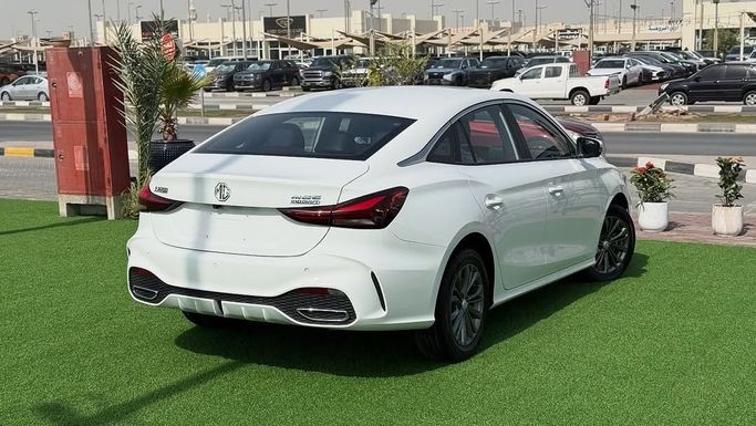 New MG 5 II Facelift, 1.5 l, 2025 in Sharjah by Badar Used Cars, White color.  | AUTO.AE
