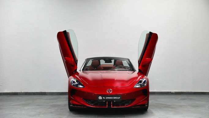 Подержанный MG Cyberster, 2023 в Шардже от Al Qassem Cars Trading Красный цвет. Китайская | AUTO.AE