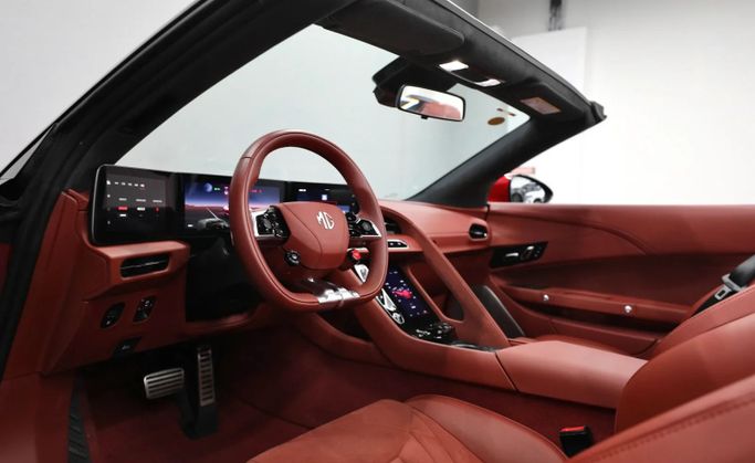 Подержанный MG Cyberster, 2023 в Шардже от Al Qassem Cars Trading Красный цвет. Китайская | AUTO.AE