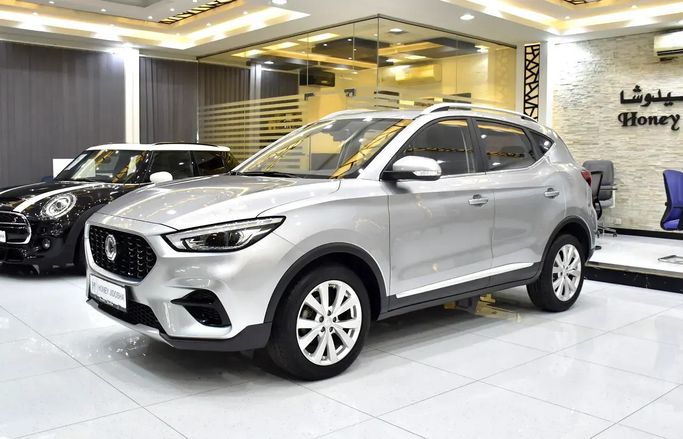 Подержанный MG ZS II Рестайлинг, 1.0 л, 2022 в Шардже от Honey Jidosha Used Cars Tr. Серебристый цвет. GCC | AUTO.AE | Объявление #273461
