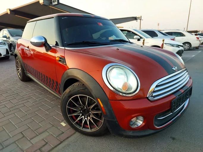 Used MINI Hatch Cooper II (R56) Facelift, 1.6 l, 2012 in Sharjah by Al Aqsa Used Cars, Orange color. GCC Specs | AUTO.AE