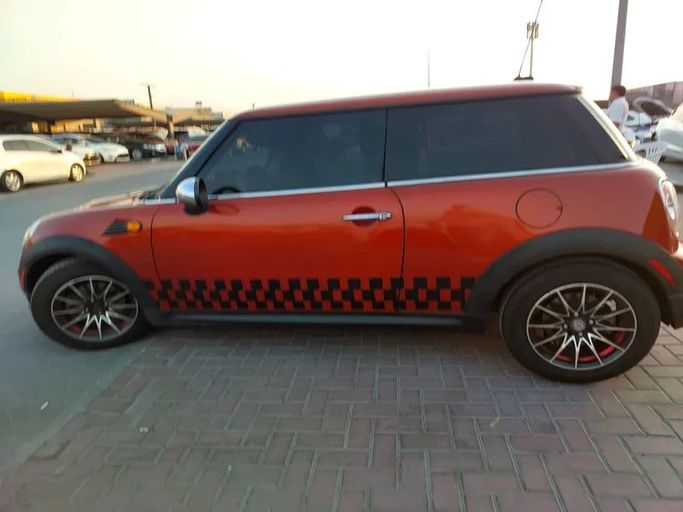 Used MINI Hatch Cooper II (R56) Facelift, 1.6 l, 2012 in Sharjah by Al Aqsa Used Cars, Orange color. GCC Specs | AUTO.AE