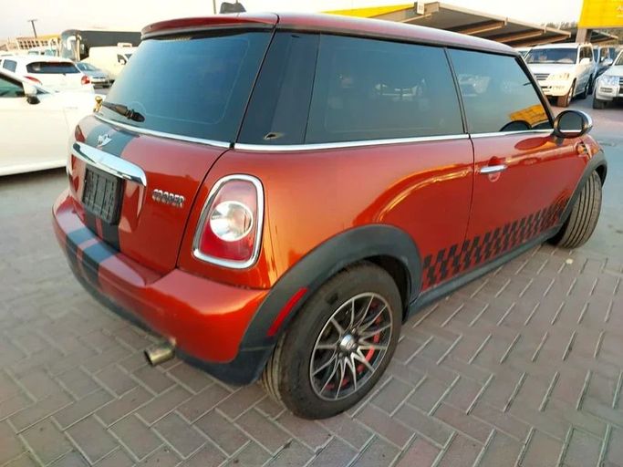 Used MINI Hatch Cooper II (R56) Facelift, 1.6 l, 2012 in Sharjah by Al Aqsa Used Cars, Orange color. GCC Specs | AUTO.AE