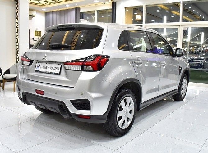 Подержанный Mitsubishi ASX I Рестайлинг 3, 2.0 л, 2021 в Шардже от Honey Gidosha Used Cars Tr. Серебристый цвет.  | AUTO.AE