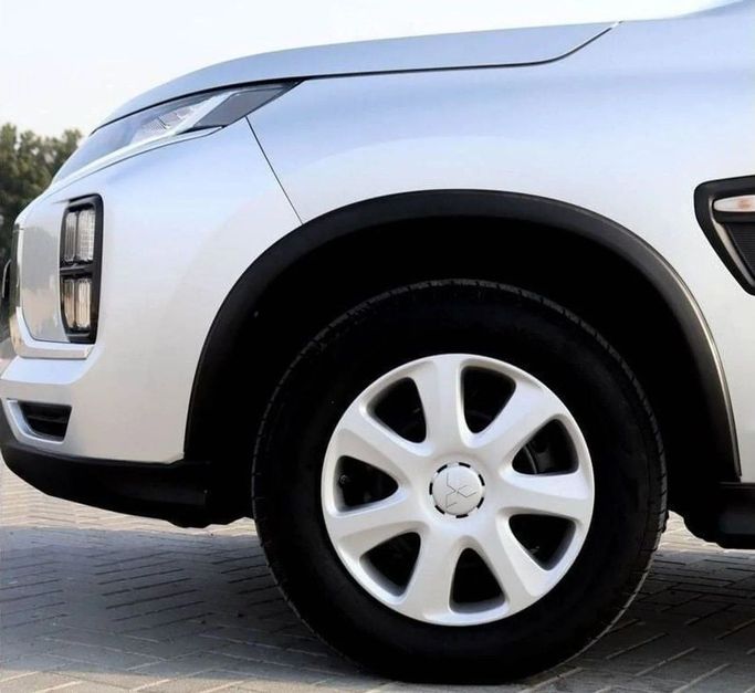 Подержанный Mitsubishi ASX I Рестайлинг 3, 2.0 л, 2022 в Шардже от Al Sayed Khamis Used Auto Trading Серебристый цвет. GCC | AUTO.AE