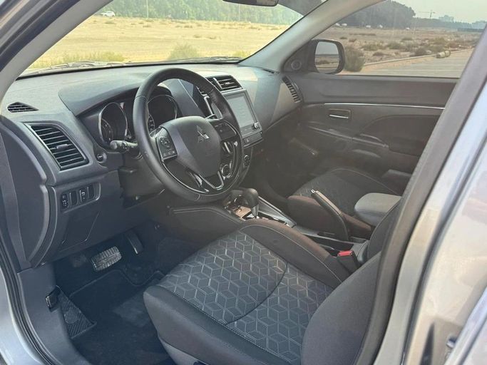 Подержанный Mitsubishi ASX I Рестайлинг 3, 2.0 л, 2024 в Шардже от Noor Al Seyoh Used Cars Серебристый цвет. GCC | AUTO.AE