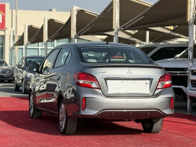 Подержанный Mitsubishi Attrage I Рестайлинг, 1.2 л, 2022 в Шардже от Al Aram Cars Серый цвет. GCC | AUTO.AE