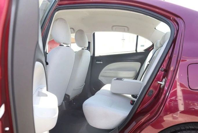 Подержанный Mitsubishi Attrage I Рестайлинг, 1.2 л, 2022 в Шардже от Al Sayed Khamis Used Cars Бордовый цвет. GCC | AUTO.AE