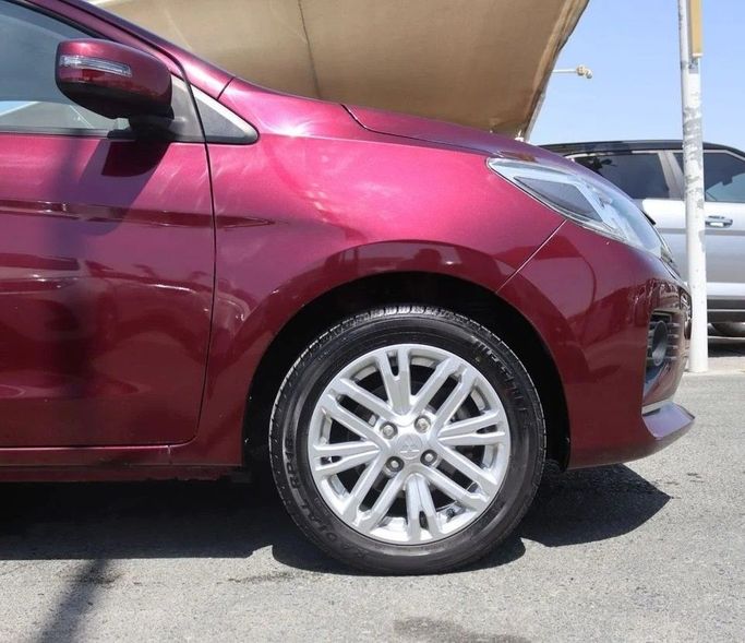 Подержанный Mitsubishi Attrage I Рестайлинг, 1.2 л, 2022 в Шардже от Al Sayed Khamis Used Cars Бордовый цвет. GCC | AUTO.AE
