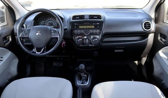 Подержанный Mitsubishi Attrage I Рестайлинг, 1.2 л, 2022 в Шардже от Al Sayed Khamis Used Auto Trading Белый цвет. GCC | AUTO.AE