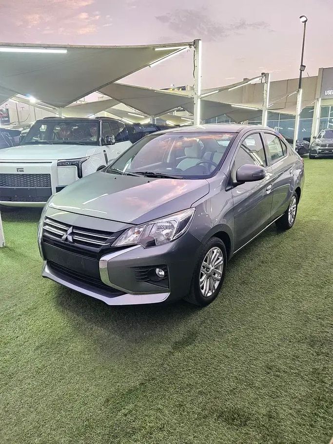 Подержанный Mitsubishi Attrage I Рестайлинг, 1.2 л, 2022 в Шардже от AL KARADAH USED CARS TRADING Серый цвет. GCC | AUTO.AE