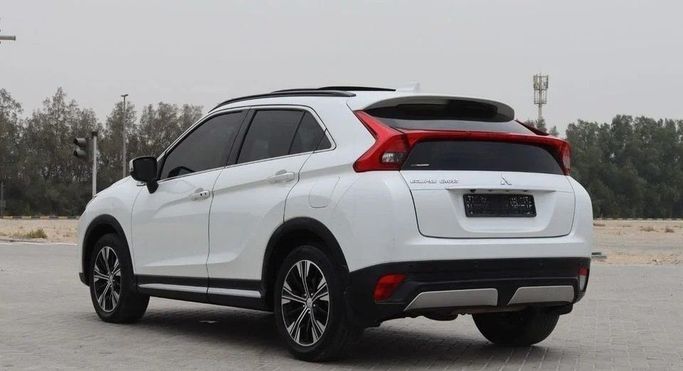 Подержанный Mitsubishi Eclipse Cross I, 1.5 л, 2019 в Шардже от Al Sayed Khamis Used Cars Белый цвет. GCC | AUTO.AE
