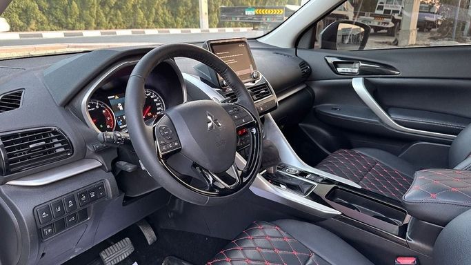 Подержанный Mitsubishi Eclipse Cross I Рестайлинг, 1.5 л, 2024 в Шардже от Halla Cars Белый цвет. GCC | AUTO.AE