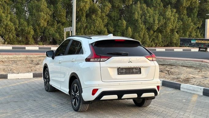 Подержанный Mitsubishi Eclipse Cross I Рестайлинг, 1.5 л, 2024 в Шардже от Halla Cars Белый цвет. GCC | AUTO.AE