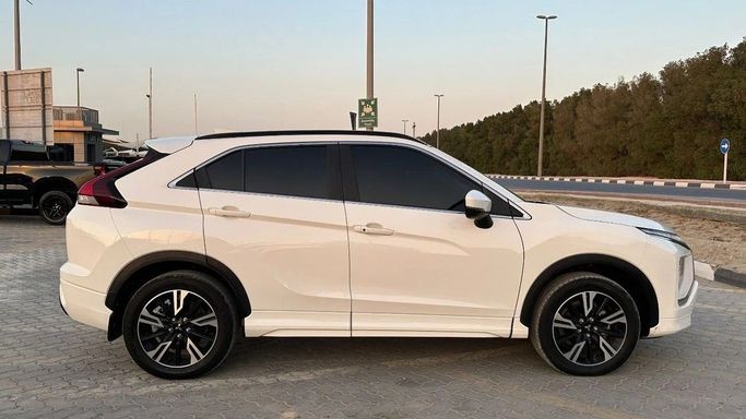 Подержанный Mitsubishi Eclipse Cross I Рестайлинг, 1.5 л, 2024 в Шардже от Halla Cars Белый цвет. GCC | AUTO.AE