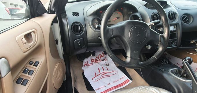 Подержанный Mitsubishi Eclipse III, 3.0 л, 2001 в Шардже от Ishtar Used Cars Белый цвет. Other | AUTO.AE