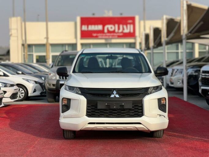 New Mitsubishi L200 V Facelift, 2.4 l, 2021 in Sharjah by Al Aram Cars, White color. GCC Specs | AUTO.AE