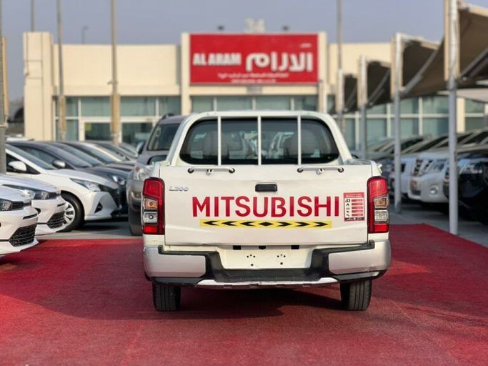 New Mitsubishi L200 V Facelift, 2.4 l, 2021 in Sharjah by Al Aram Cars, White color. GCC Specs | AUTO.AE