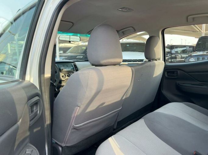 New Mitsubishi L200 V Facelift, 2.4 l, 2021 in Sharjah by Al Aram Cars, White color. GCC Specs | AUTO.AE