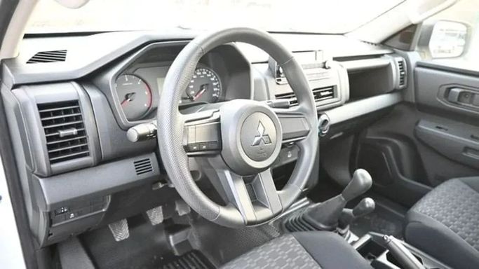 New Mitsubishi L200 VI, 2.4 l, 2025 in Sharjah by Nour Alnukhba Motors, White color. Other | AUTO.AE