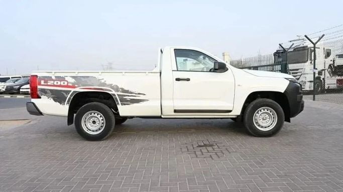 New Mitsubishi L200 VI, 2.4 l, 2025 in Sharjah by Nour Alnukhba Motors, White color. Other | AUTO.AE