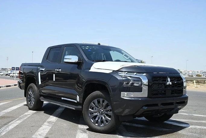 New Mitsubishi L200 VI, 2.4 l, 2025 in Sharjah by Nour Alnukhba Motors, Black color. GCC Specs | AUTO.AE