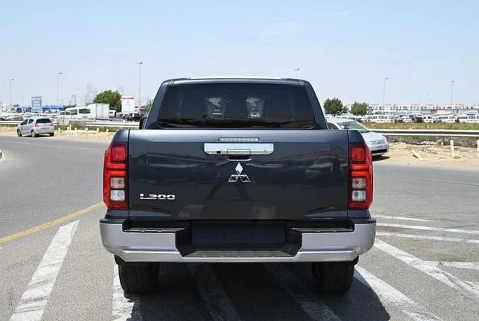 New Mitsubishi L200 VI, 2.4 l, 2025 in Sharjah by Nour Alnukhba Motors, Black color. GCC Specs | AUTO.AE