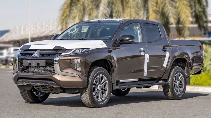Новый Mitsubishi L200 V Рестайлинг, 2.4 л, 2023 в Шардже от Nour Alnukhba Motors Коричневый цвет. Other | AUTO.AE