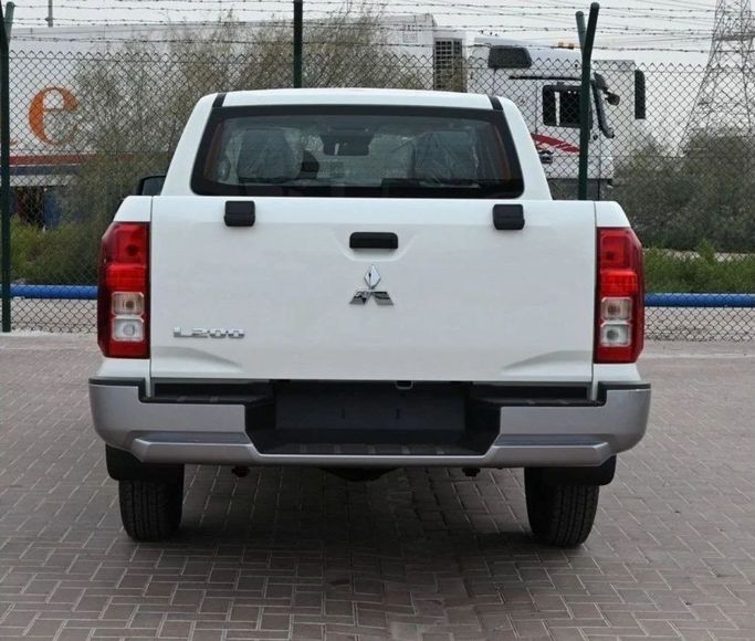 New Mitsubishi L200 VI, 2.4 l, 2024 in Sharjah by Nour Alnukhba Motors, White color. Other | AUTO.AE