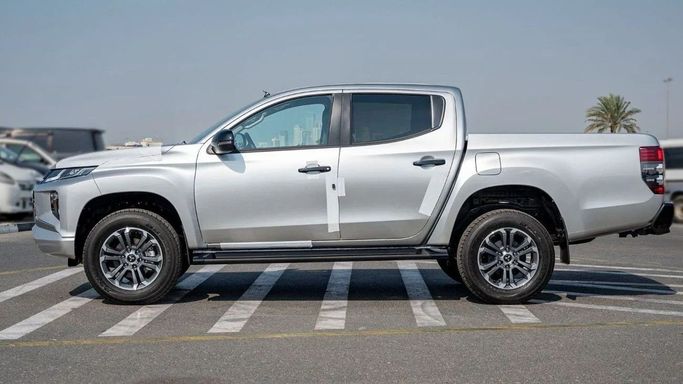 Новый Mitsubishi L200 VI, 2.4 л, 2023 в Шардже от Nour Alnukhba Motors Серый цвет. Other | AUTO.AE