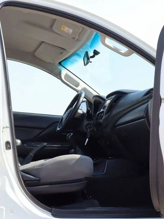 Подержанный Mitsubishi L200 V Рестайлинг, 2.4 л, 2022 в Шардже от Al Sayed Khamis Used Auto Trading Белый цвет. GCC | AUTO.AE