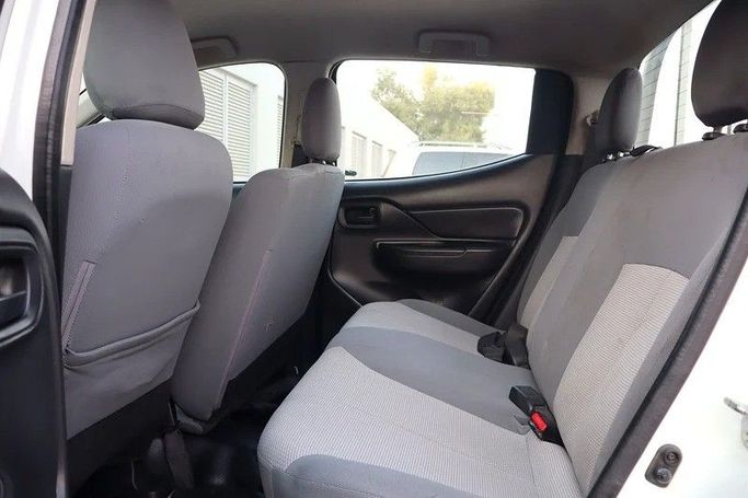 Used Mitsubishi L200 V Facelift, 2.4 l, 2020 in Sharjah by Al Rukin Al Saudi, White color. GCC Specs | AUTO.AE